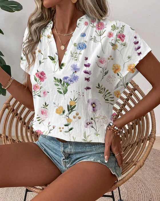Kortärmad blus med blommönster
